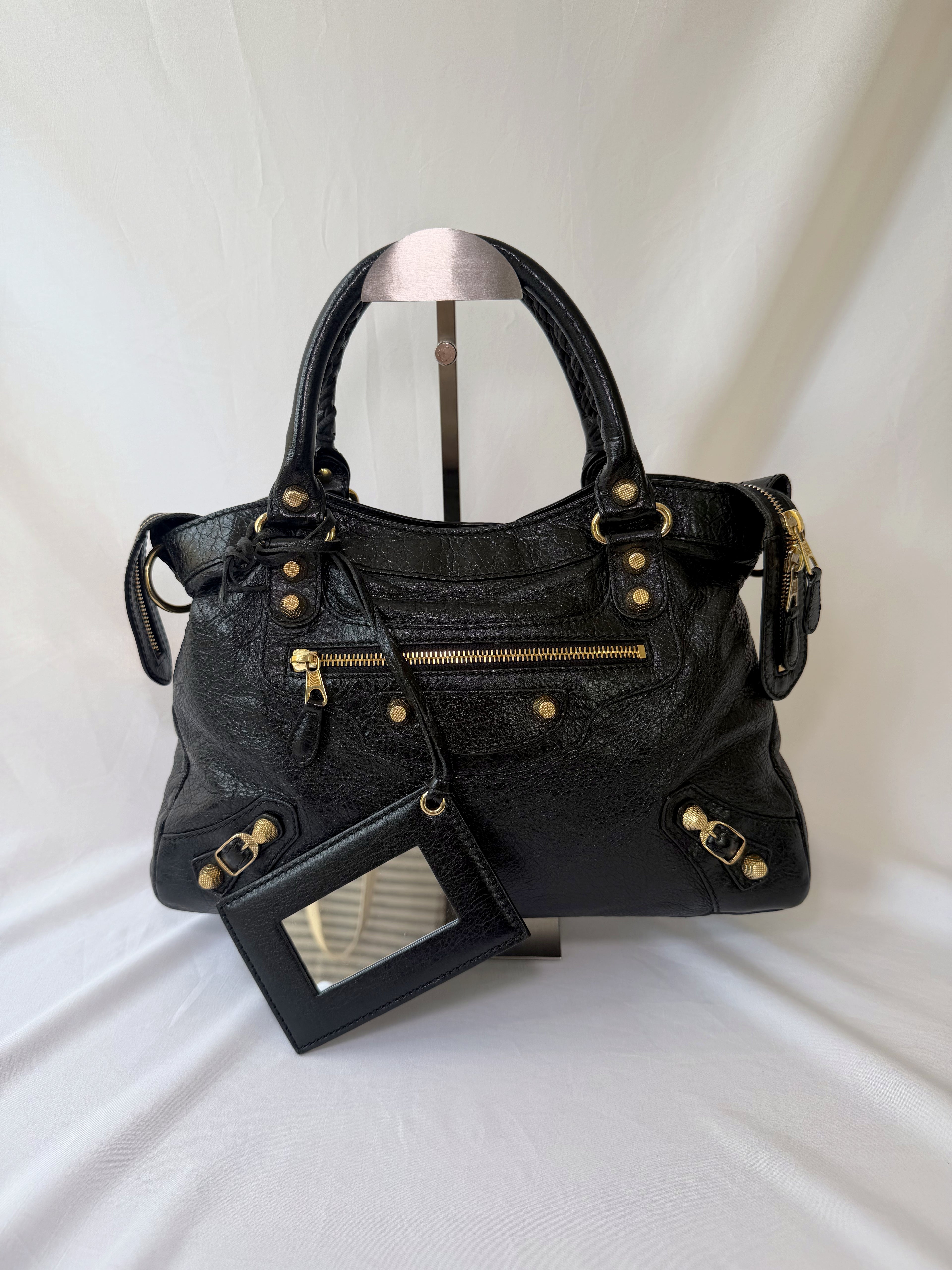 Balancing The Town Bag with Giant Gold Hardware in Black