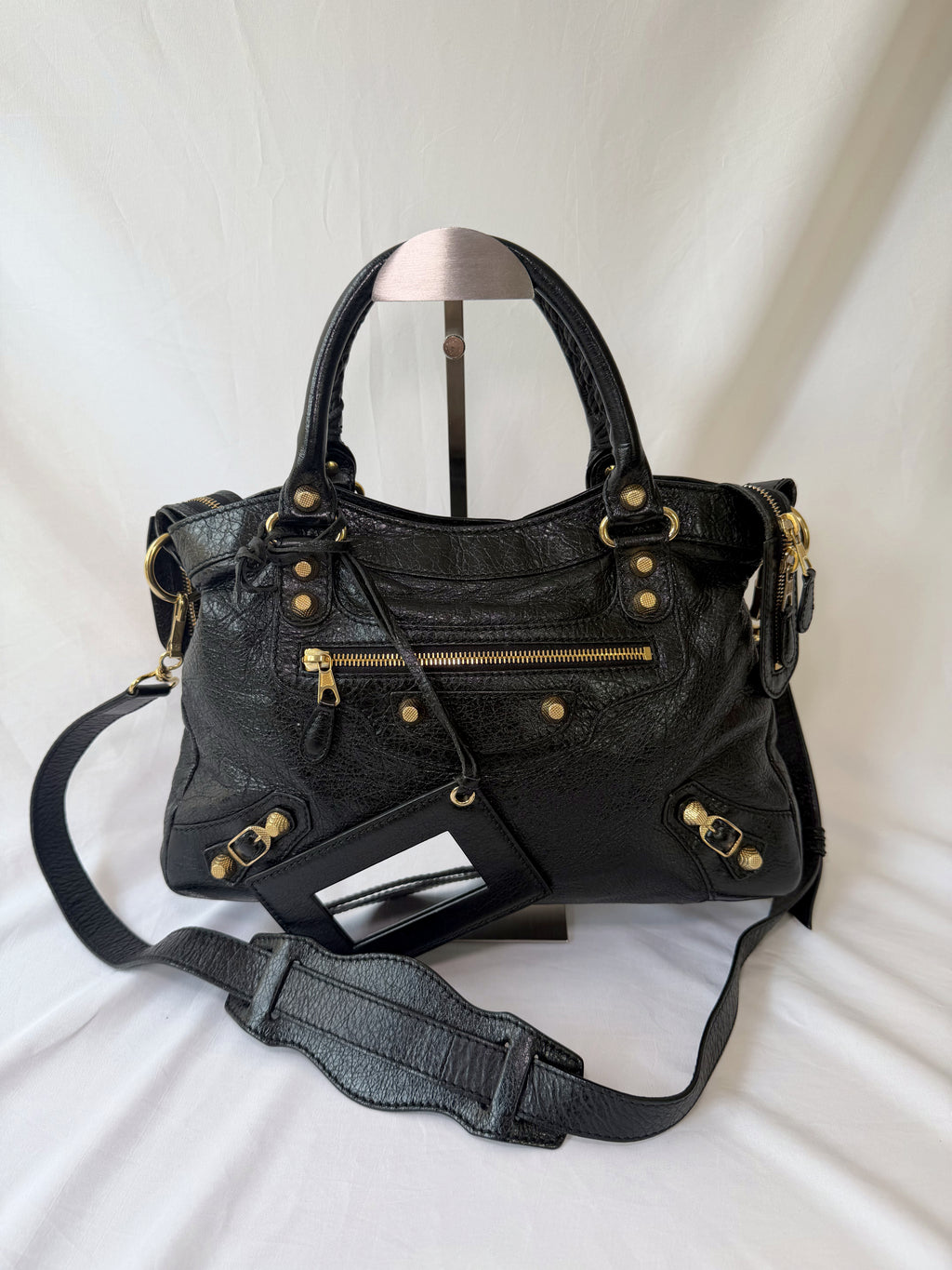Balancing The Town Bag with Giant Gold Hardware in Black