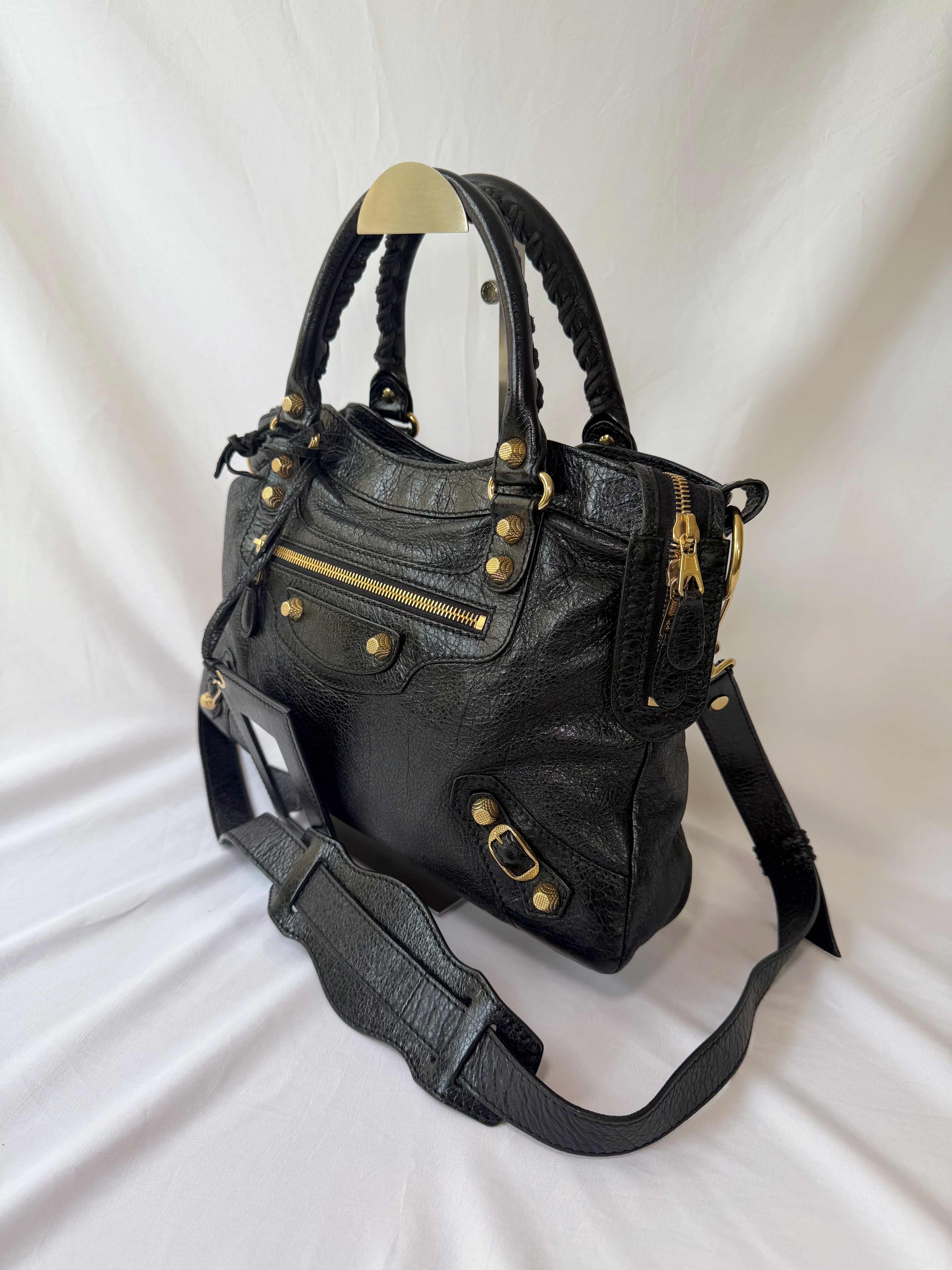 Balancing The Town Bag with Giant Gold Hardware in Black