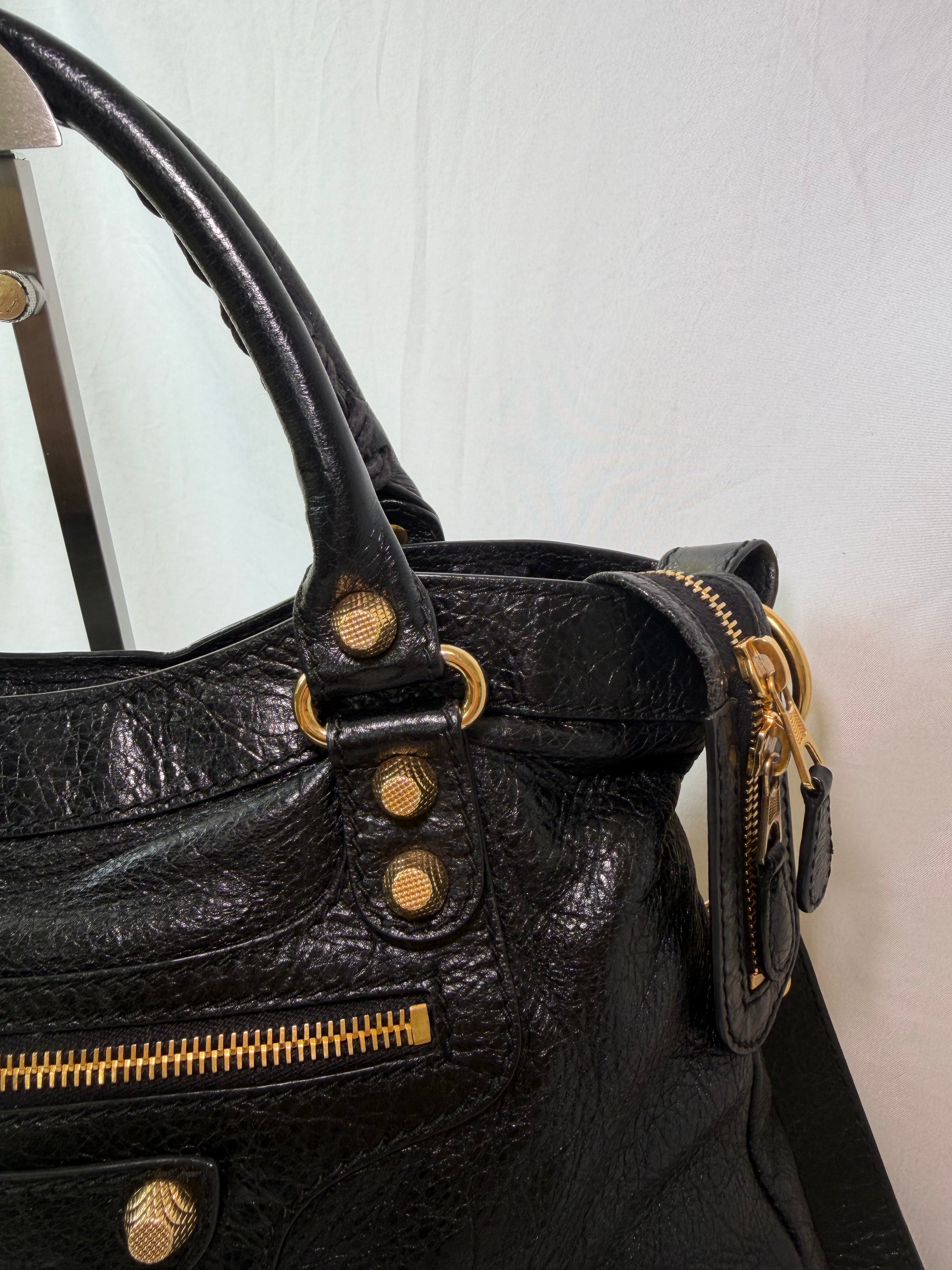 Balancing The Town Bag with Giant Gold Hardware in Black