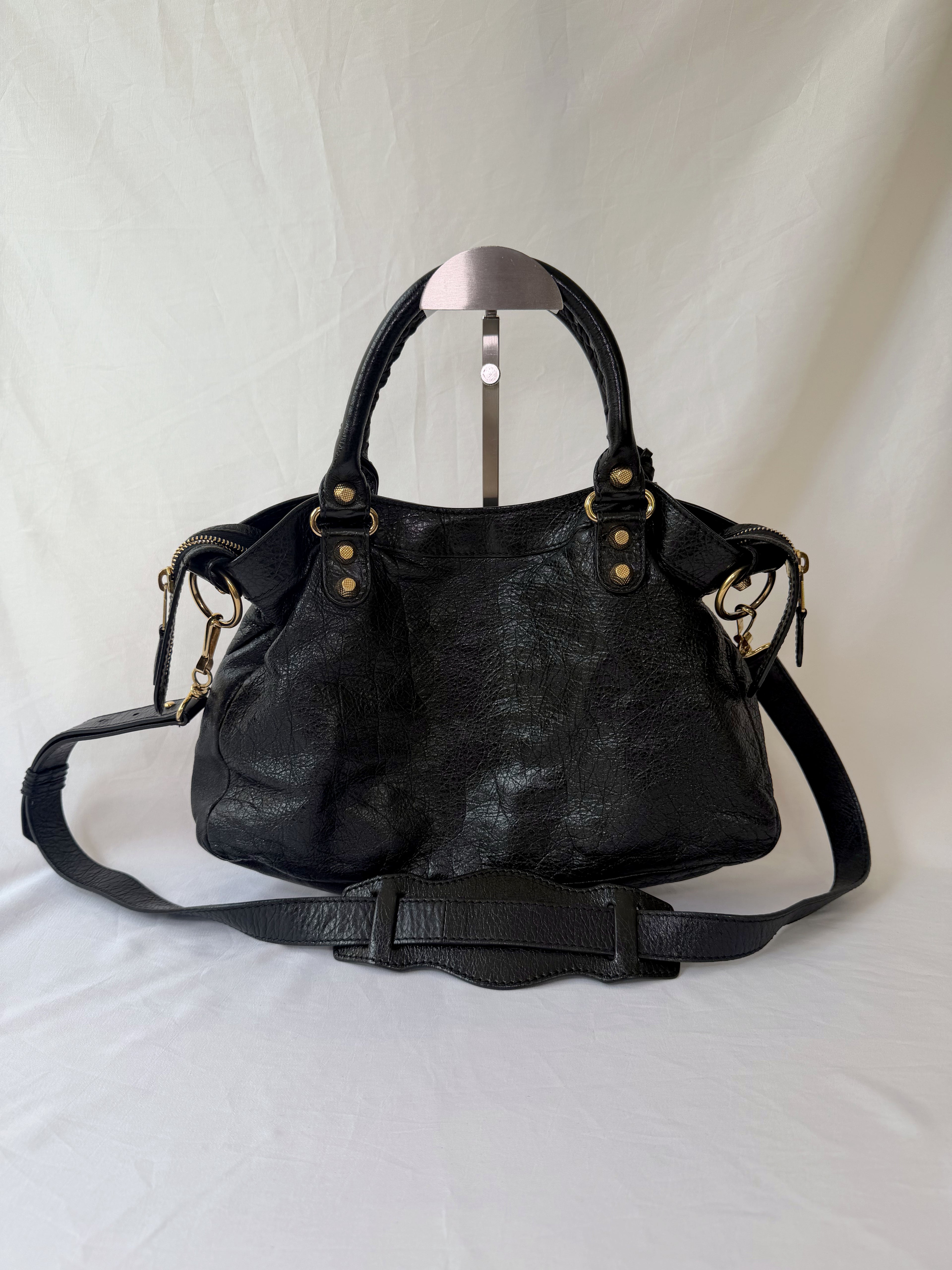 Balancing The Town Bag with Giant Gold Hardware in Black