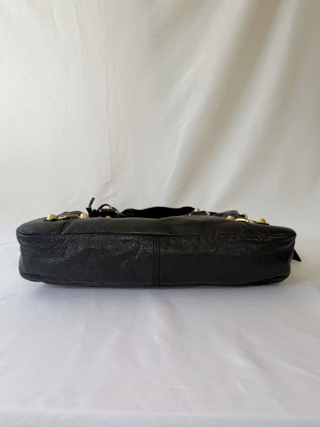 Balancing The Town Bag with Giant Gold Hardware in Black