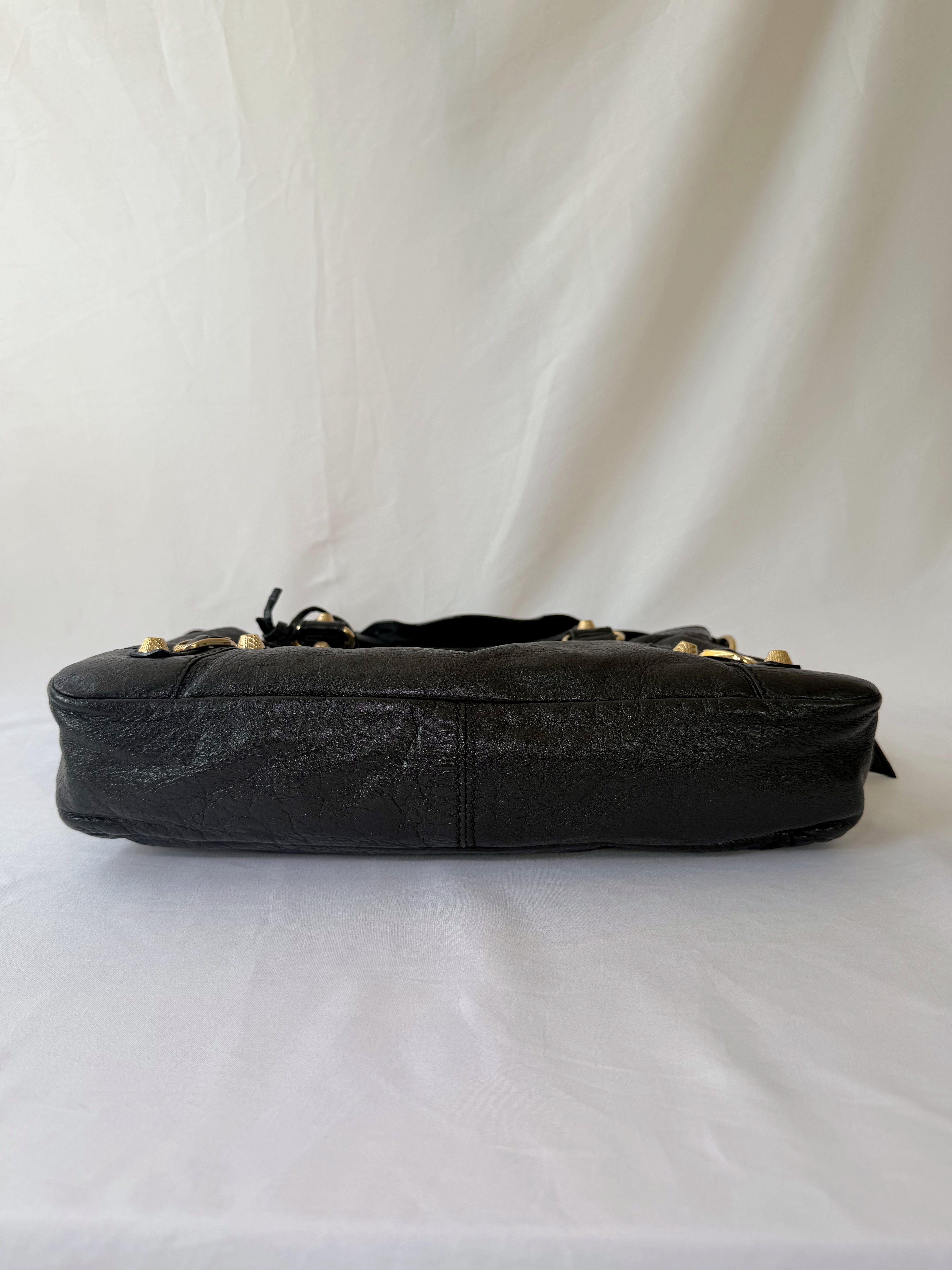 Balancing The Town Bag with Giant Gold Hardware in Black