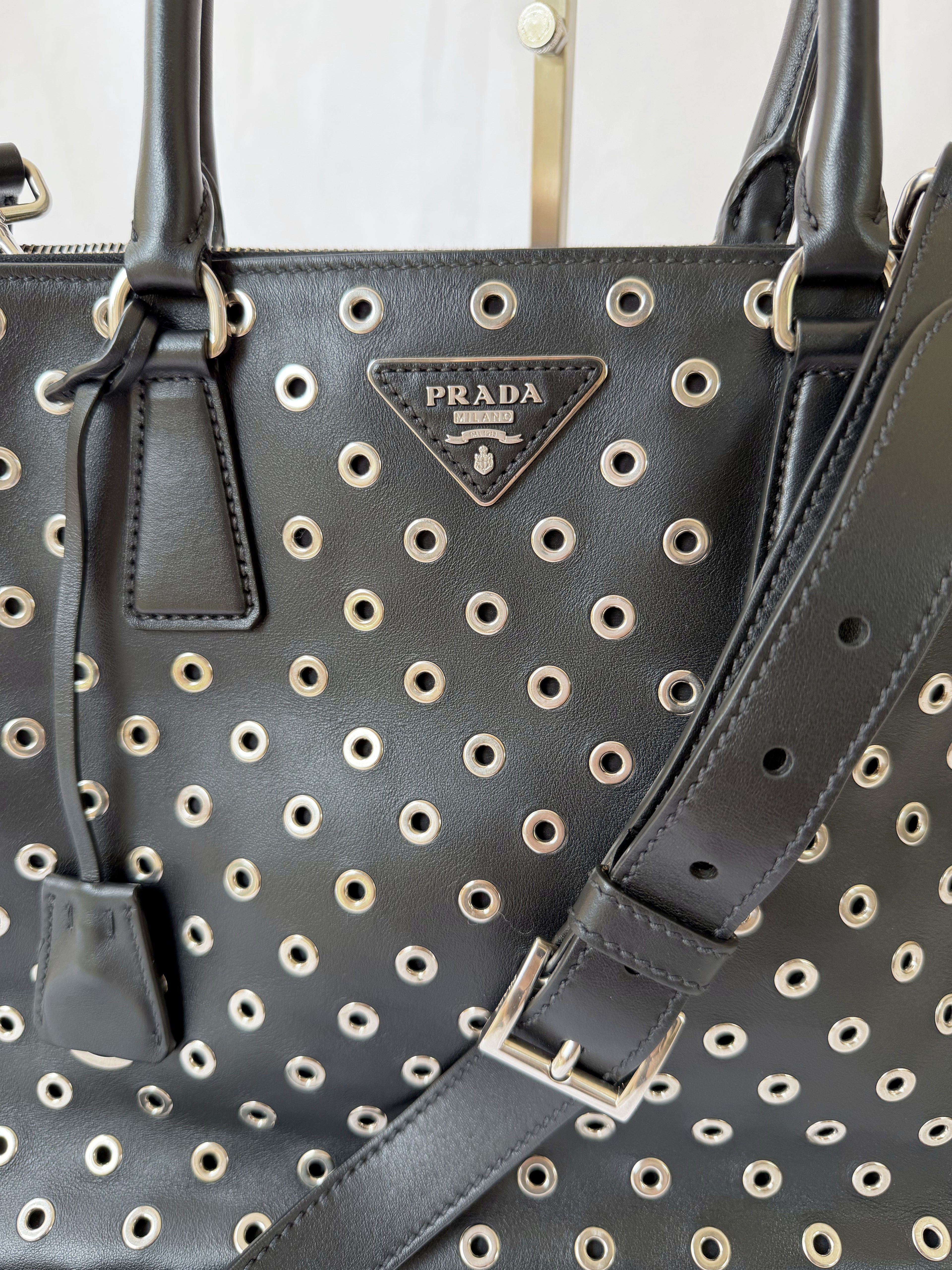 Prada Galleria Eyelet Tote in Black Calfskin with Metal Eyelets