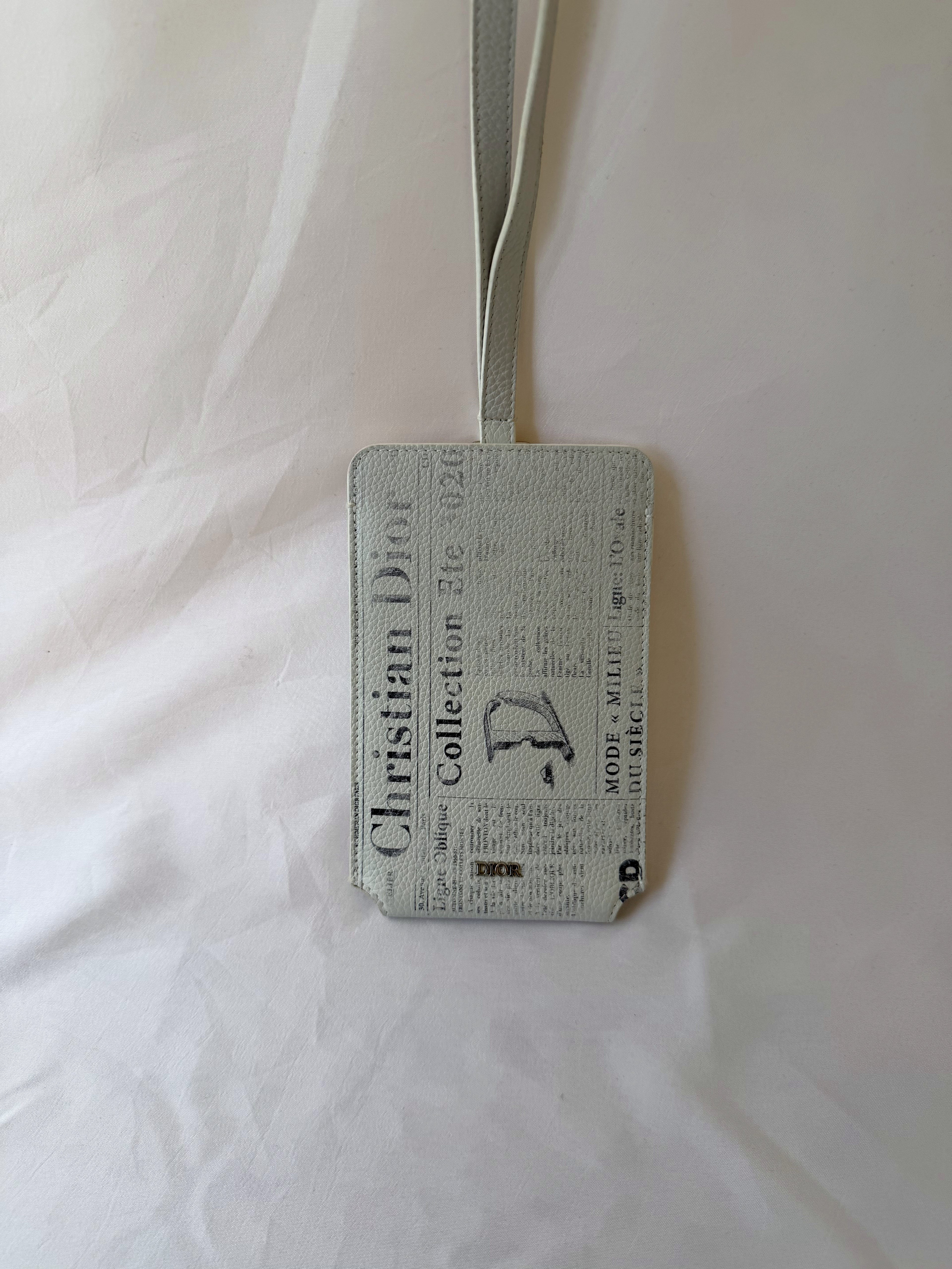 Christian Dior x Daniel Arsham Phone Holder with Newspaper Print, Grained Calfskin