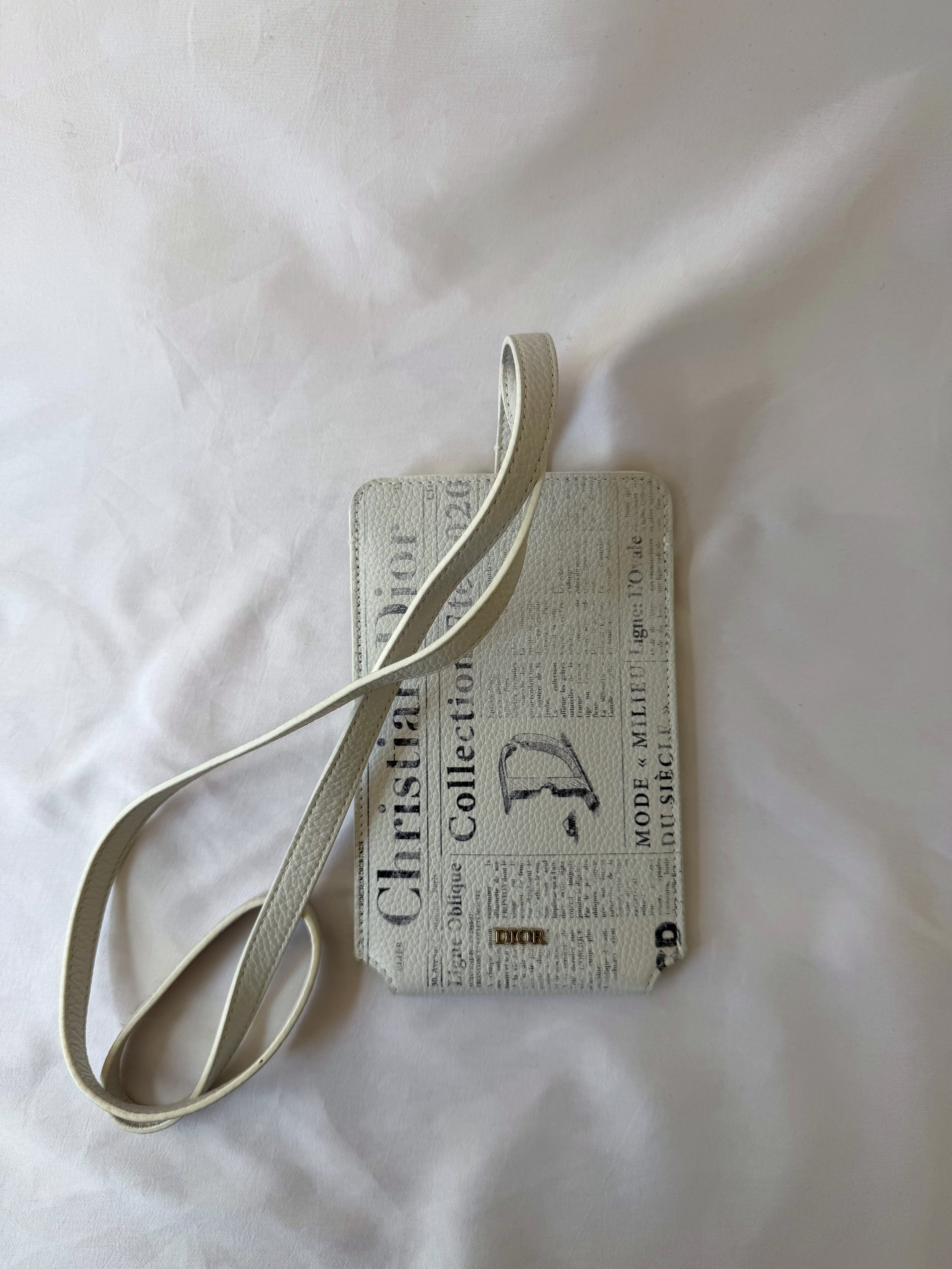 Christian Dior x Daniel Arsham Phone Holder with Newspaper Print, Grained Calfskin