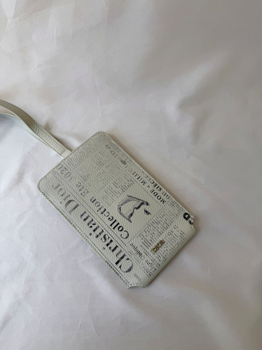 Christian Dior x Daniel Arsham Phone Holder with Newspaper Print, Grained Calfskin